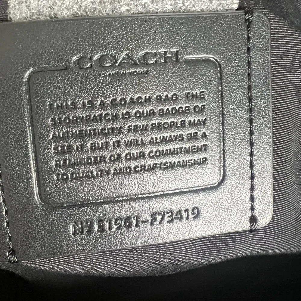 COACH BECKETT PORTFOLIO BRIEF IN SIGNATURE LEATHER